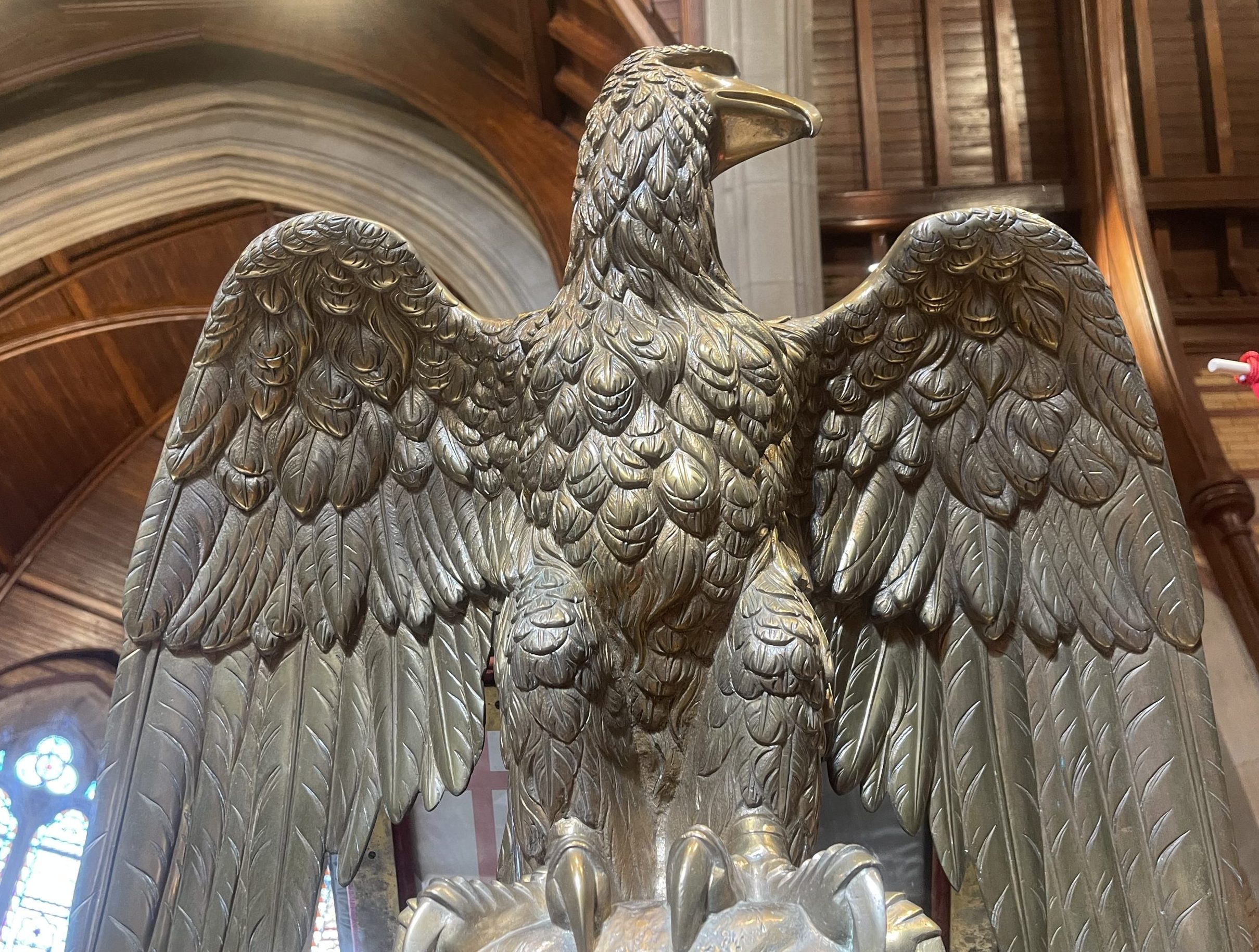 bronze eagle on lectern inside church