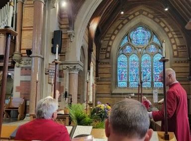 church choir in red vestments