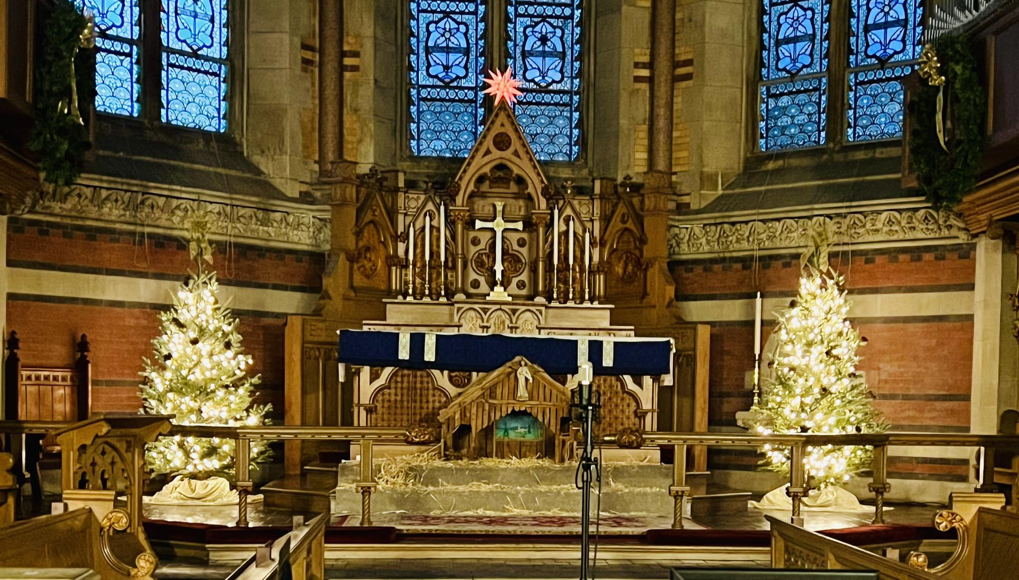 altar of a church with christmas trees