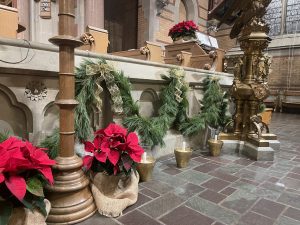 poinsettias at church altar 